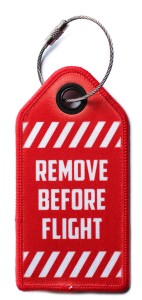 Zawieszka bagażowa do walizki Remove Before Flight identyfikator